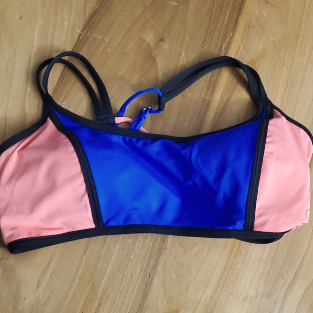 Bikini top brand is Calia by Carrie Underwood